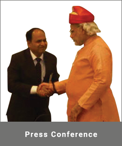 Rajendra Pate handshake with PM Narendra Modi