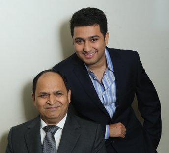 Young woman enjoying fresh air outdoors while holding a bunch of yellow flowers.